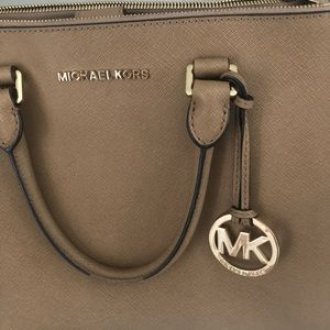Michael kors bag with multiple compartments